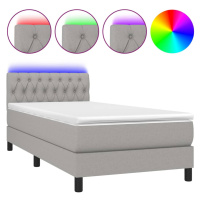 vidaXL Posteľ boxsping s matracom a LED bledosivá 90x190 cm látka